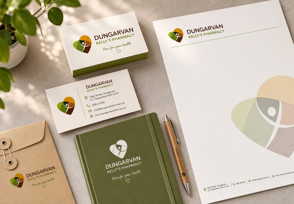 Dungarvan Kelly's Pharmacy business cards, letterhead, notebook and envelope flat-lay