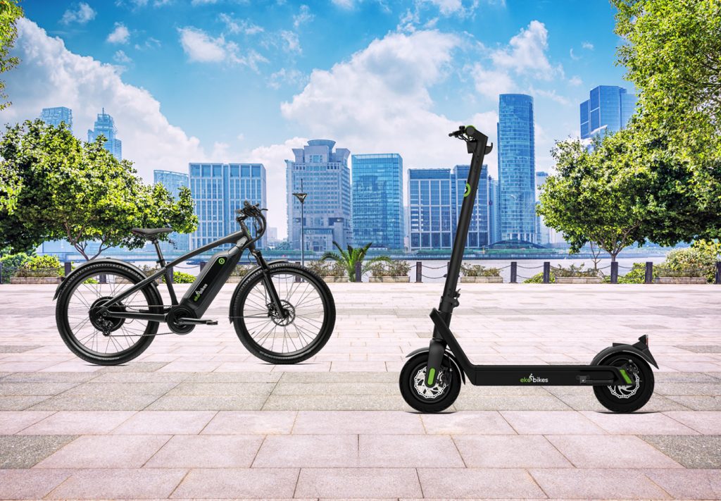 eko bikes e-bike and e-scooter product photography against a city skyline