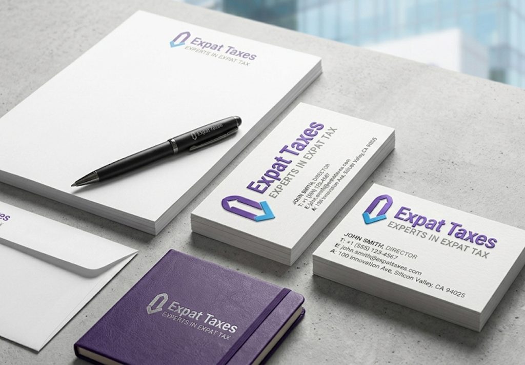 Expat Taxes letterhead, business cards, notebook and envelope flat-lay