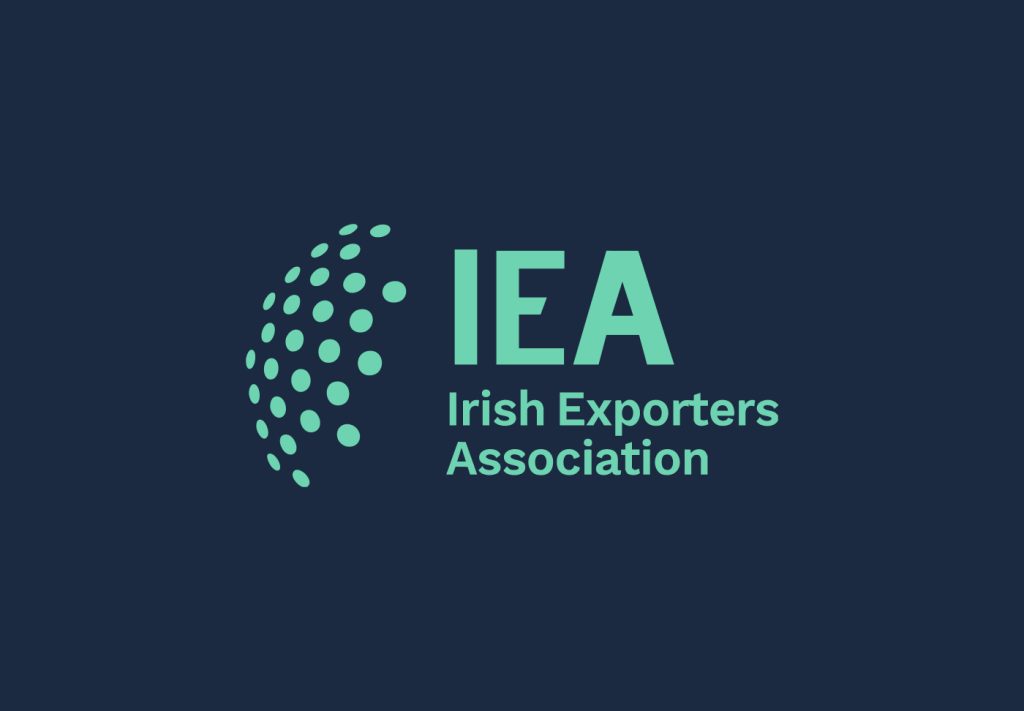 IEA logo, mint green on dark navy
